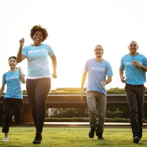 Group of happy and diverse volunteers